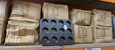 Ten boxes of Cup Cake Baking Trays (24 per box).