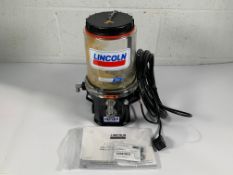 Pre-owned Lincoln Progressive 4L Lubricant Pump P203 (MN: 644-40874-3).