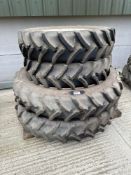 Set 340/85R48 rear and 320/90R 32 front wheels and tyres to suit New Holland
