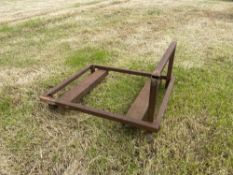 Tank stand with pallet fork receptors