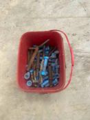 Bucket of large nuts and bolts