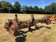 Cousins 3 leg subsoiler with depth wheels and rear crumbler