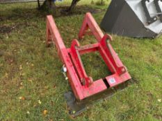 Bag lifter with Caterpillar attachments