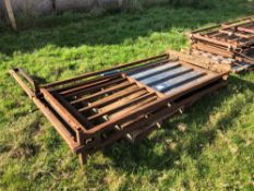 Sliding cattle race gate