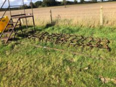 Seed harrows with stretcher
