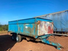 Twidale twin axle tipping trailer with grain chute and fuel tank. Tyres: 12.5/80/15.3