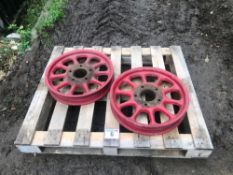 Pair vintage cast wheels