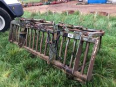 Cherry Products 9ft muck grab with hydraulic rave on pin and cone attachments.