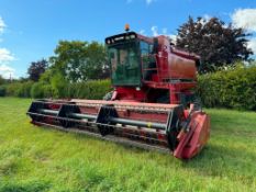 1994 Case Axial Flow 1680 combine harvester with Case 1030 20ft header with straw chopper on Goodyea