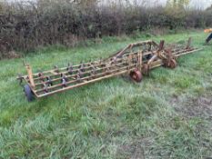 Coopers 22ft spring tine cultivator with depth wheels, hydraulic folding