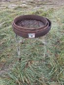 Vintage wooden riddle on stand