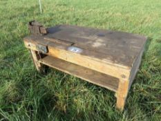 Wooden work bench with vices