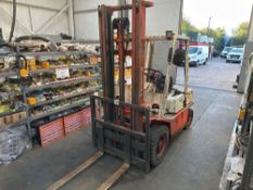 Datsun 2.5T diesel forklift truck. ROPS frame, work lights, solid tyres. Hours: 7,268. Keys in the o