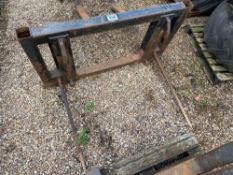 Homemade twin tine bale spike on pin and cone brackets