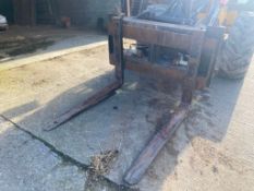 Pallet tines with back plate on pin & cone brackets