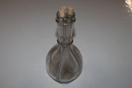 A glass four section decanter