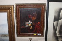A framed oil on board still life study