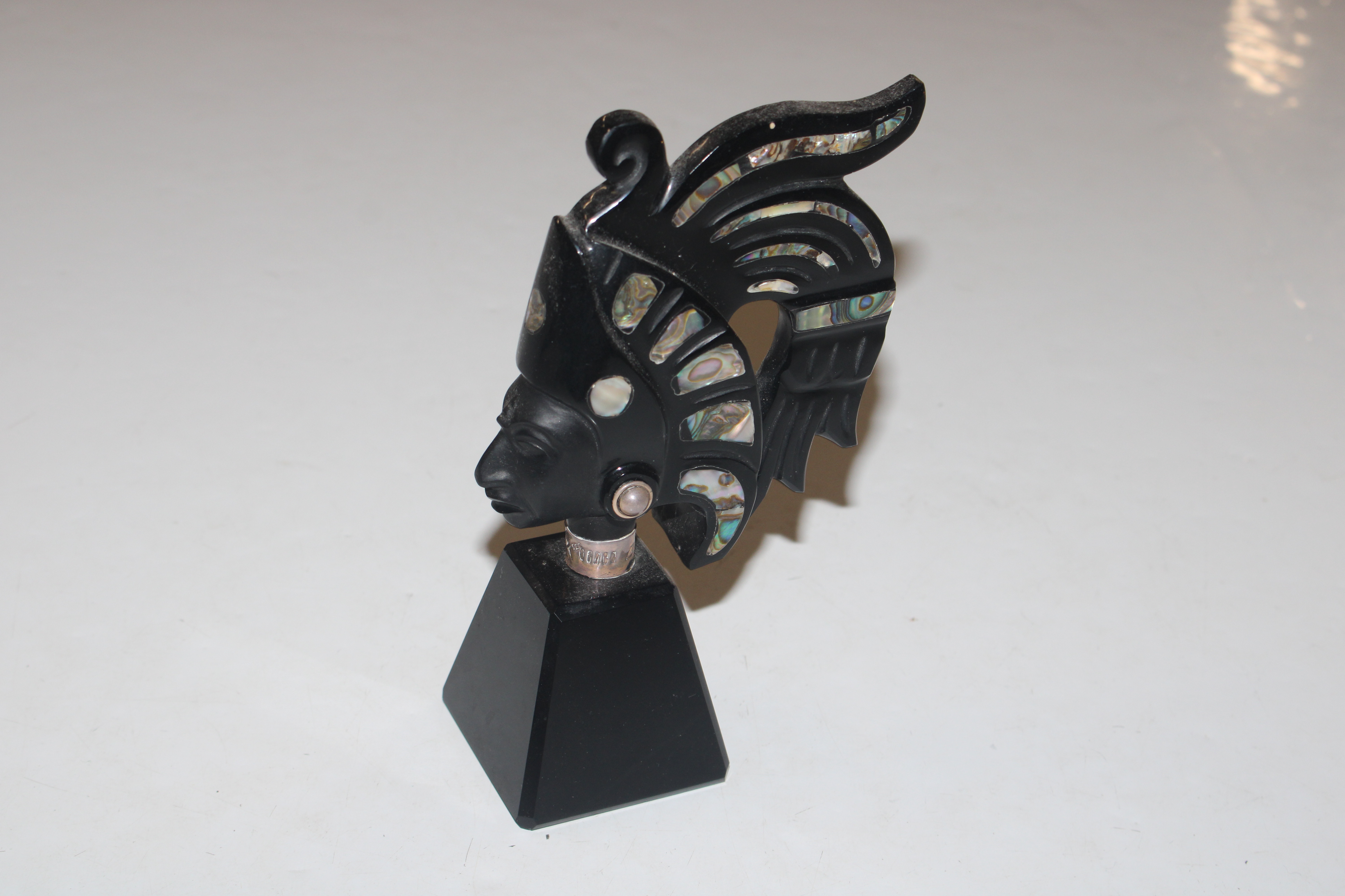 An abalone shell inlaid bust with 925 silver colla