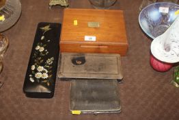 A pair of cased opera glasses; a lacquered glove b