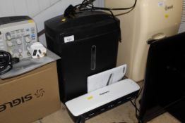 A Bonsaii paper shredder and a laminator