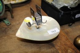 A shell and silver mounted smokers stand