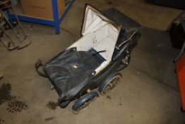 A Swallow toy pram