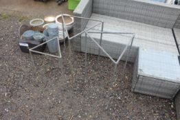 Three galvanised plant supports