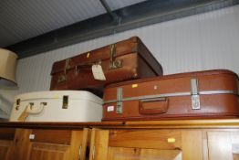 Three vintage suitcases