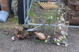 A quantity of various metal garden ornaments in th