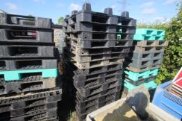 Quantity of plastic pallets.