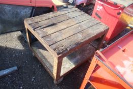 Heavy duty wheeled shelving unit.