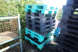 Quantity of plastic pallets.