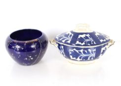 A French blue and white pottery tureen, having stylised floral decoration and an Edwardian blue