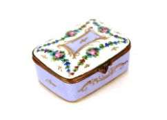 A small Limoges hinged box and cover, having floral spray decoration to the lid, no sides,