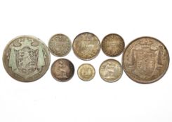 A collection of eight items of William IV silver coinage; two half crowns; a sixpence; two groats;