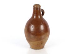 A 17th Century salt glazed stoneware flagon, with tiger band decoration