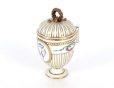 A Meissen chocolate cup and cover, possibly Marcolini period of ribbed baluster form, central