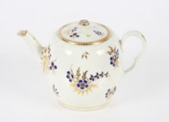 A 19th Century English porcelain part tea set having blue floral decoration heightened in gilt,