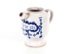 A fine London Delft wet drug jar, decorated in blue, the scrollwork panel inscribed 
