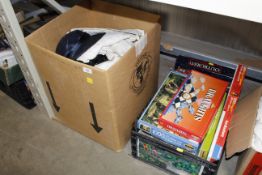 Two boxes containing board games, puzzles and line