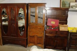 An oak and leaded glazed bureau bookcase