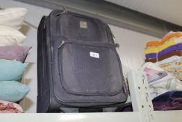 A Tripp suitcase