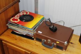 A Bush record player and a collection of records