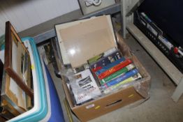 A box of DVDs, videos and books etc.
