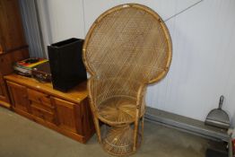 A wicker peacock chair