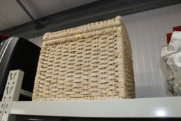 A wicker laundry basket