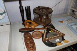 A collection of wooden items to include figures, f