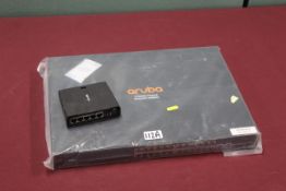 Hewlett Packard Aruba J9779A PoE+ network switch, unused, lacking power cable and a MikroTik PoE