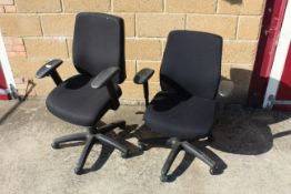 A pair of revolving adjustable office chairs with arm rests SUBJECT TO VAT