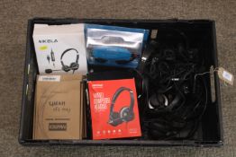 A box containing various headsets SUBJECT TO VAT